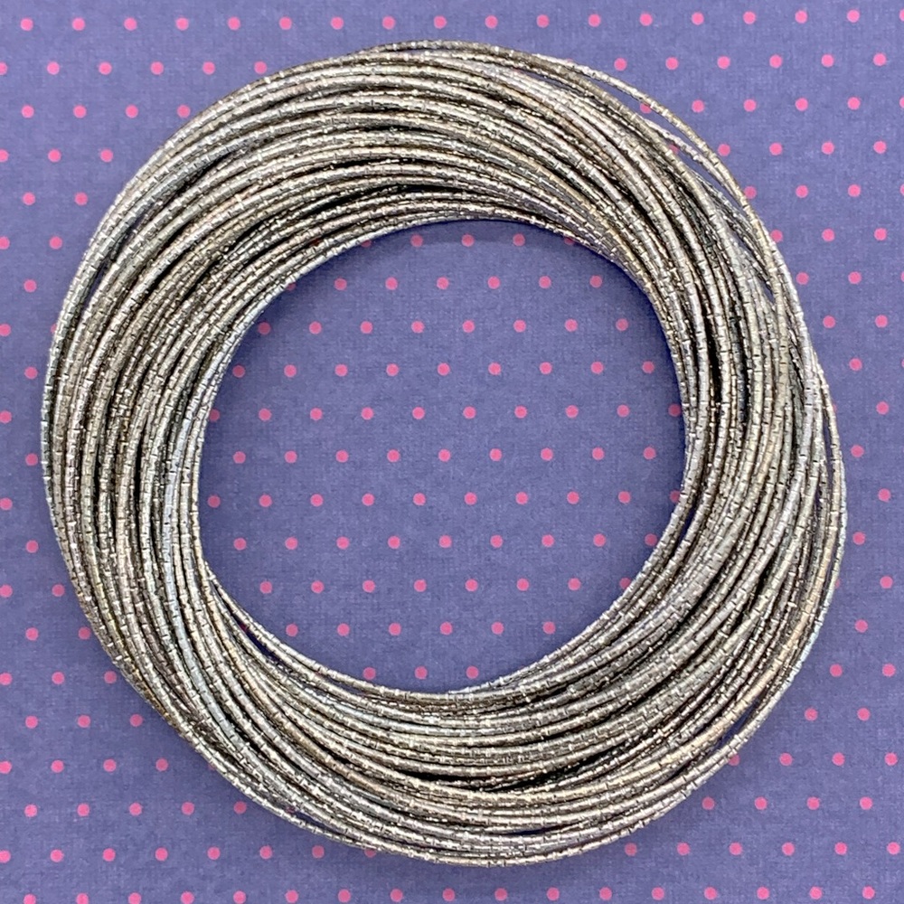Fun multi-ring silver bangle bracelet!